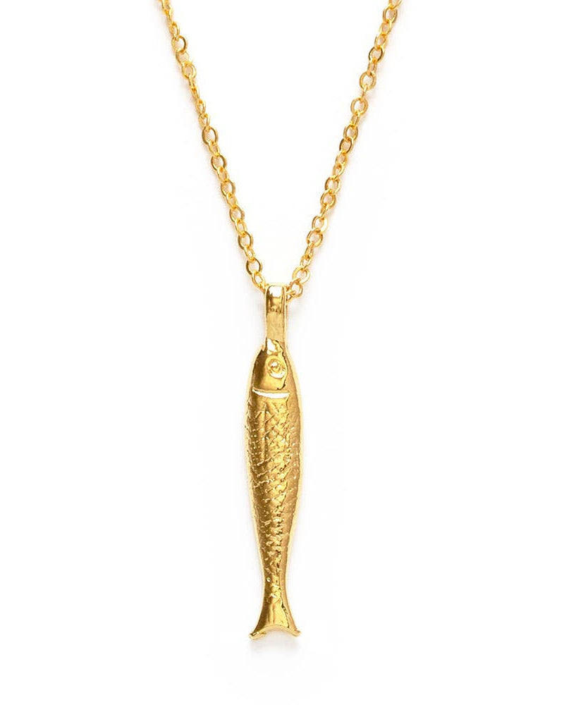Gold fish-shaped pendant on a chain against a white background